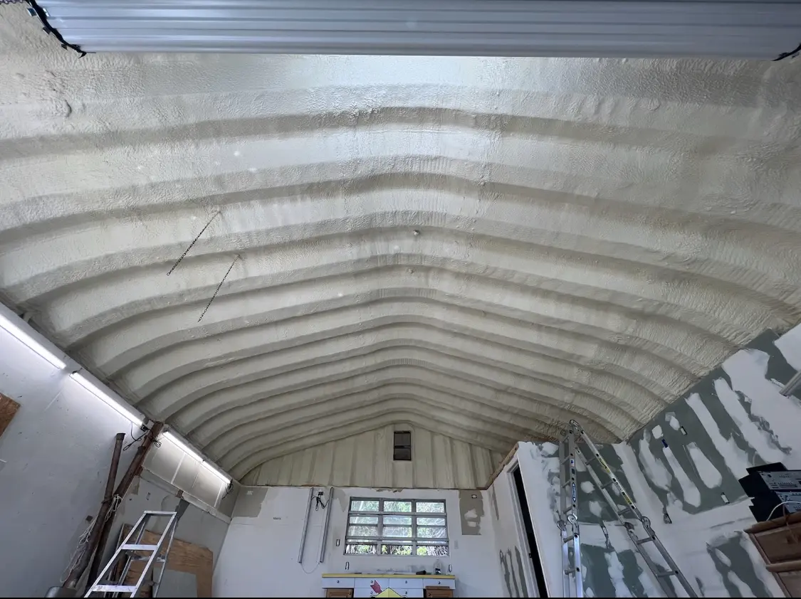 Spray polyurethane foam applied to the underside of a metal roof deck in Cherry Valley